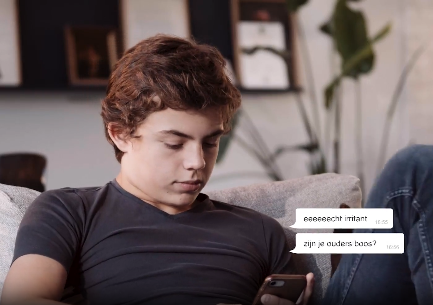 Teenager chatting on a smartphone